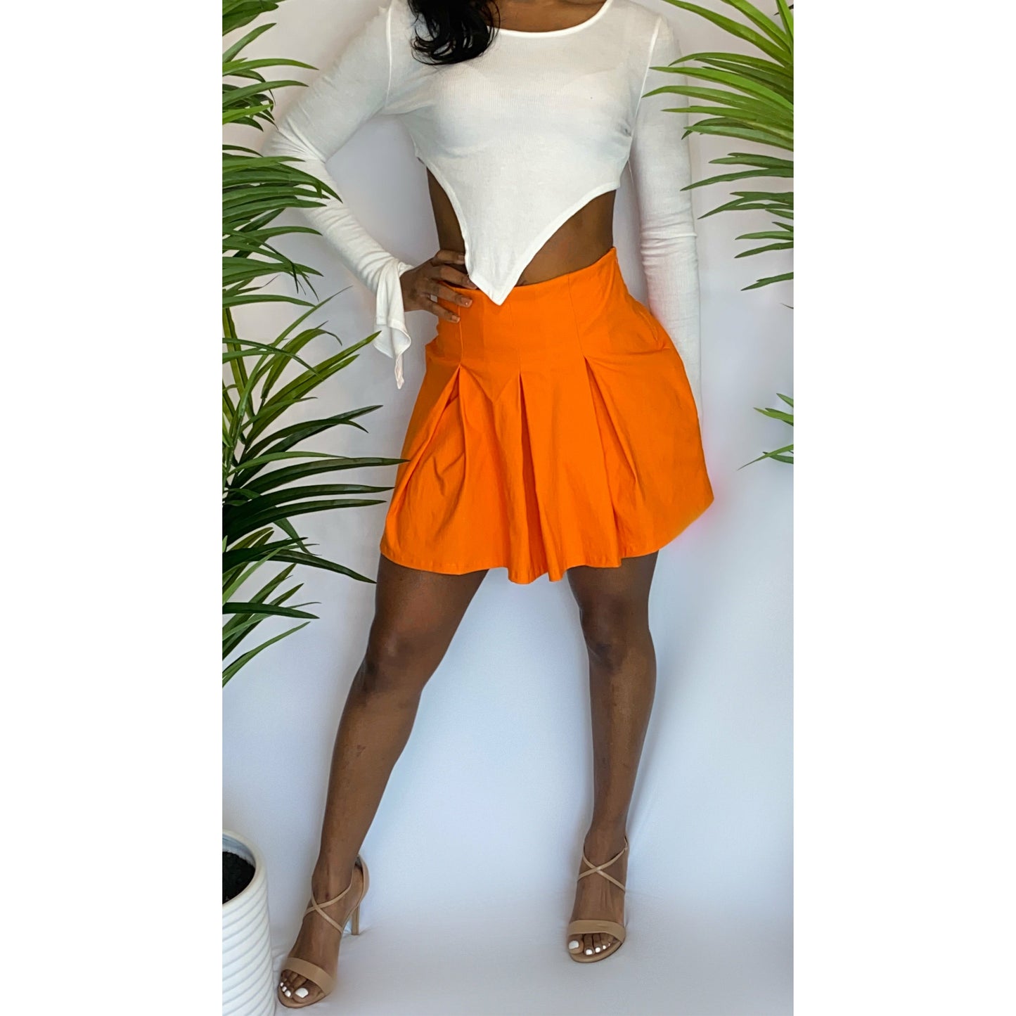 Orange pleated skirt